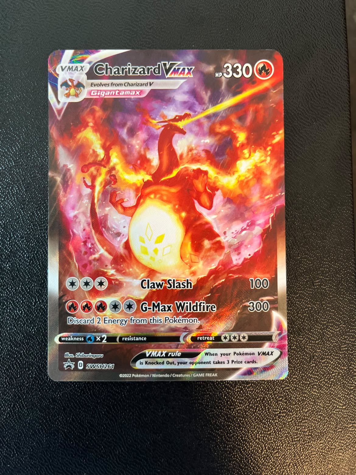 Charizard VMAX 261 SWSH Black Star Promos - Near Mint (Se billeder af det konkrete kort)