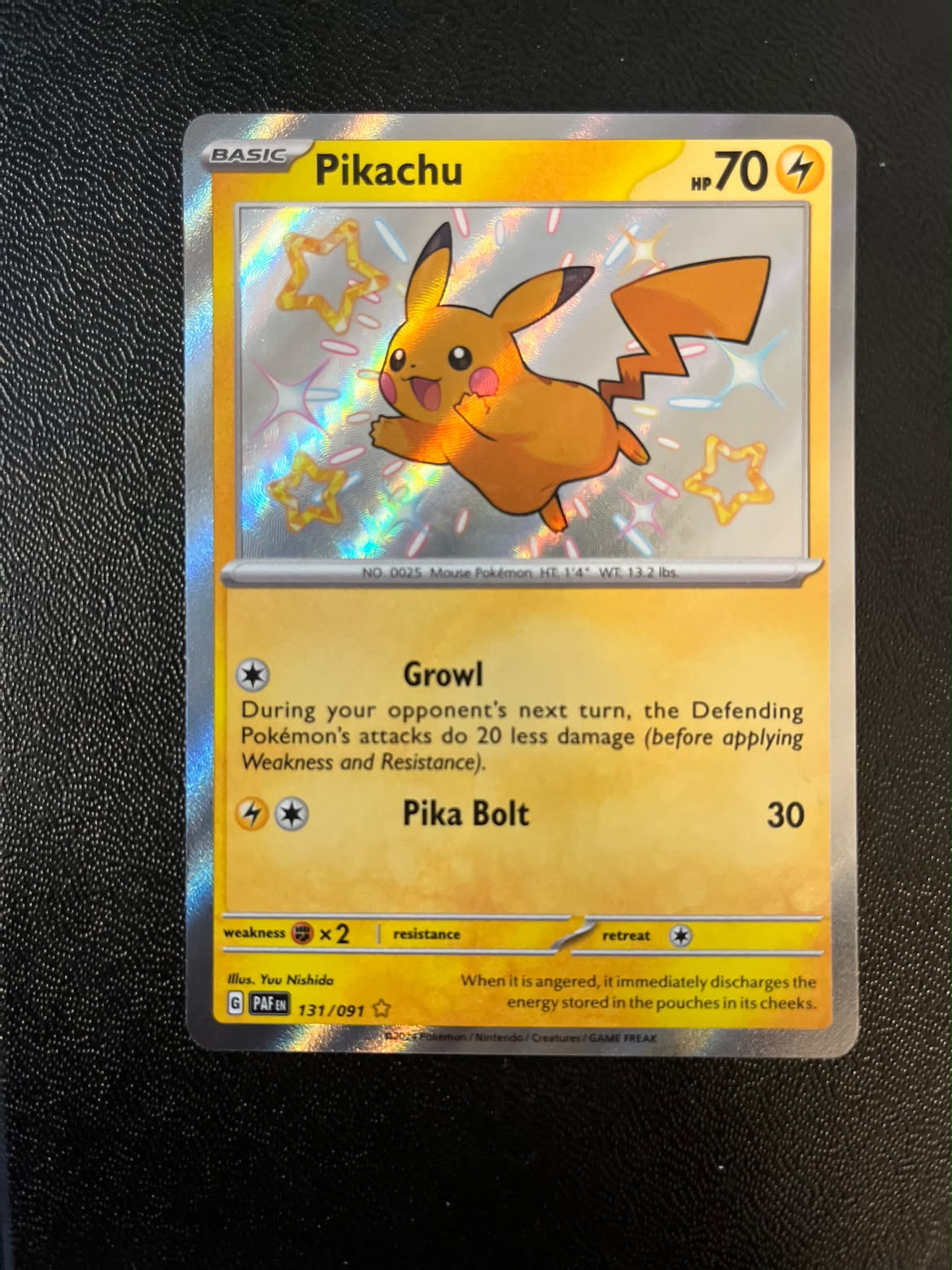Pikachu 131 Paldean Fates - Near Mint (Se billeder af det konkrete kort)